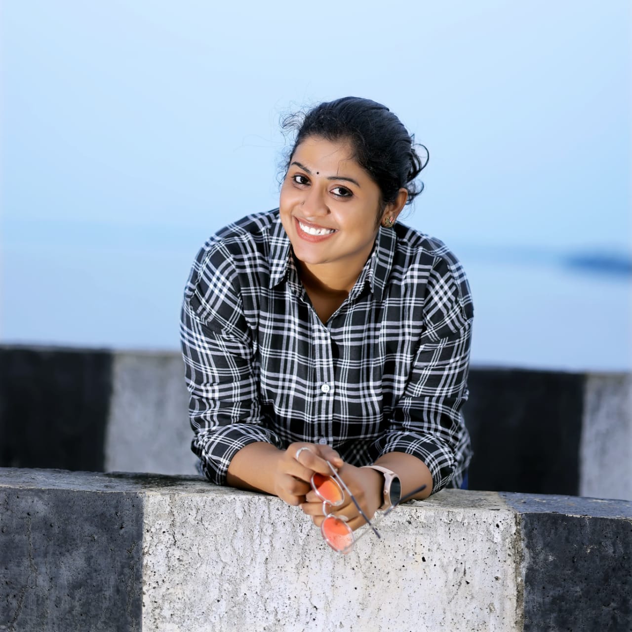 Indhu, professional bridal makeup artist from Telangana